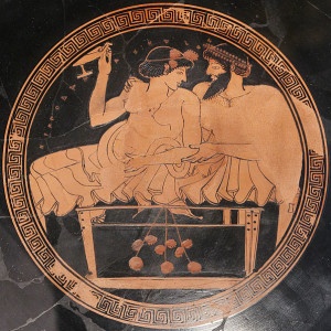 Vaso a figure rosse proveniente dall'Antica Grecia che ritrae una prostituta con un cliente