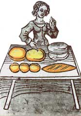 Una donna impasta dei dolci. Il croccante è un antico dolce medievale a tutt'oggi molto apprezzato