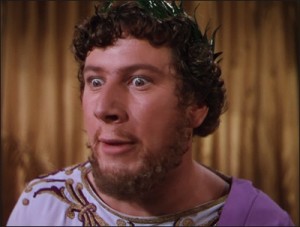 Peter Ustinov nella sua memorabile interpretazione di Nerone nel film "Quo vadis?" (1951). I capelli inanellati erano caratteristici dell'eccentrico Imperatore