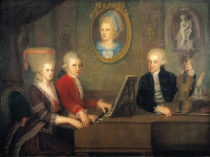 Wolfang Amadeus e Maria Anna Mozart, detta "Nannerl", si esibiscono al pianoforte alla presenza del padre Leopold
